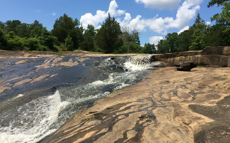 a river flowing through a rocky area