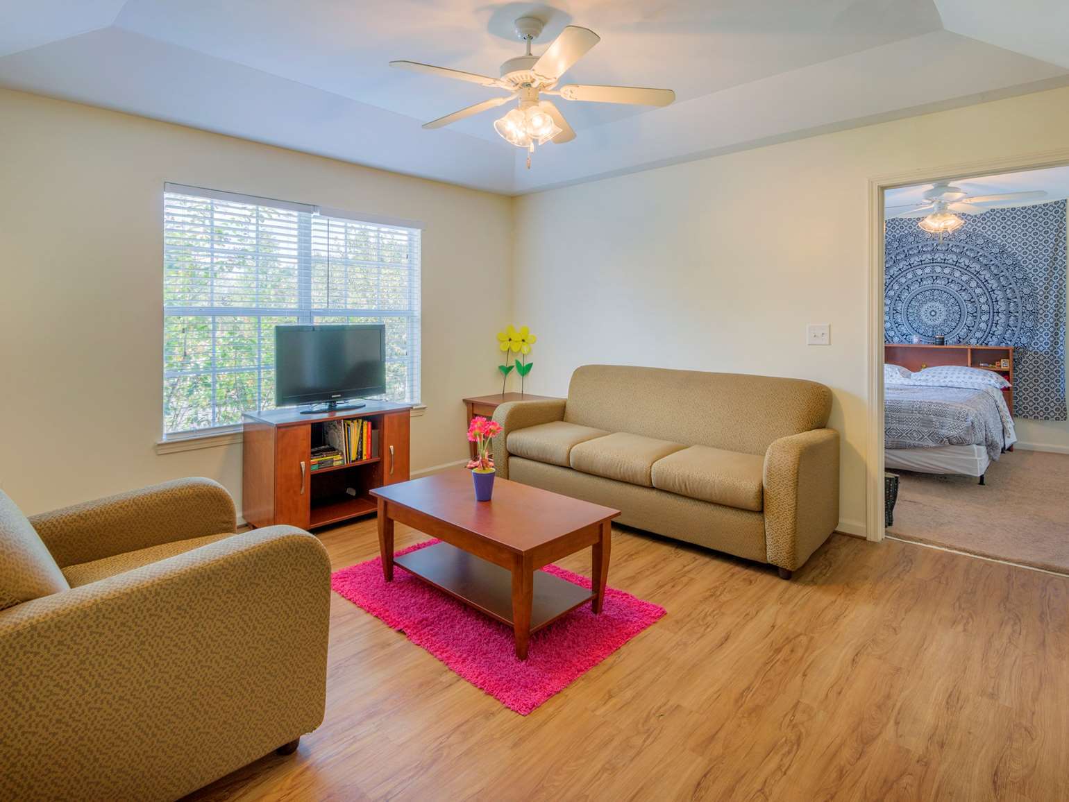 a living room with a couch and a table