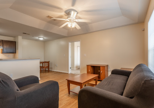 a living room with a couch and a table