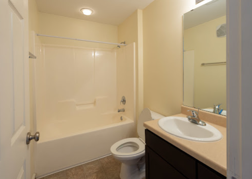 a bathroom with a sink and toilet